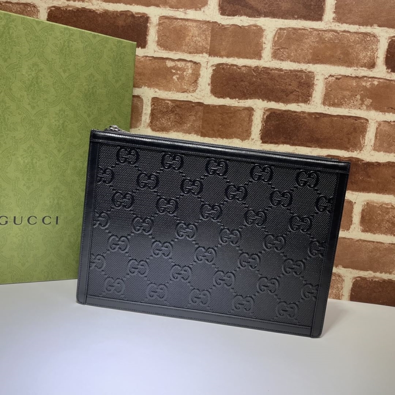 G*u*i clutch bags